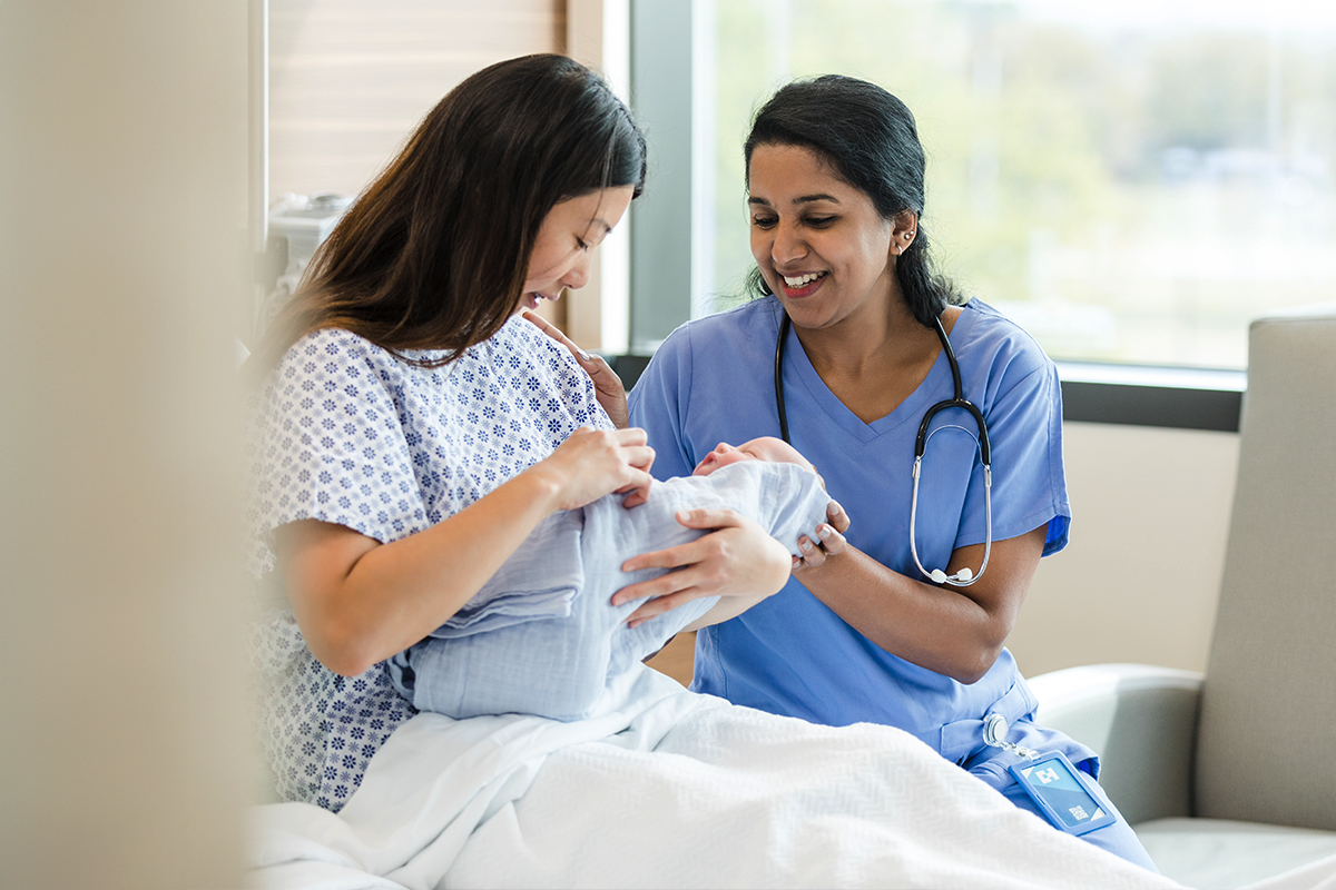 Clinician working with a patient in a medical setting