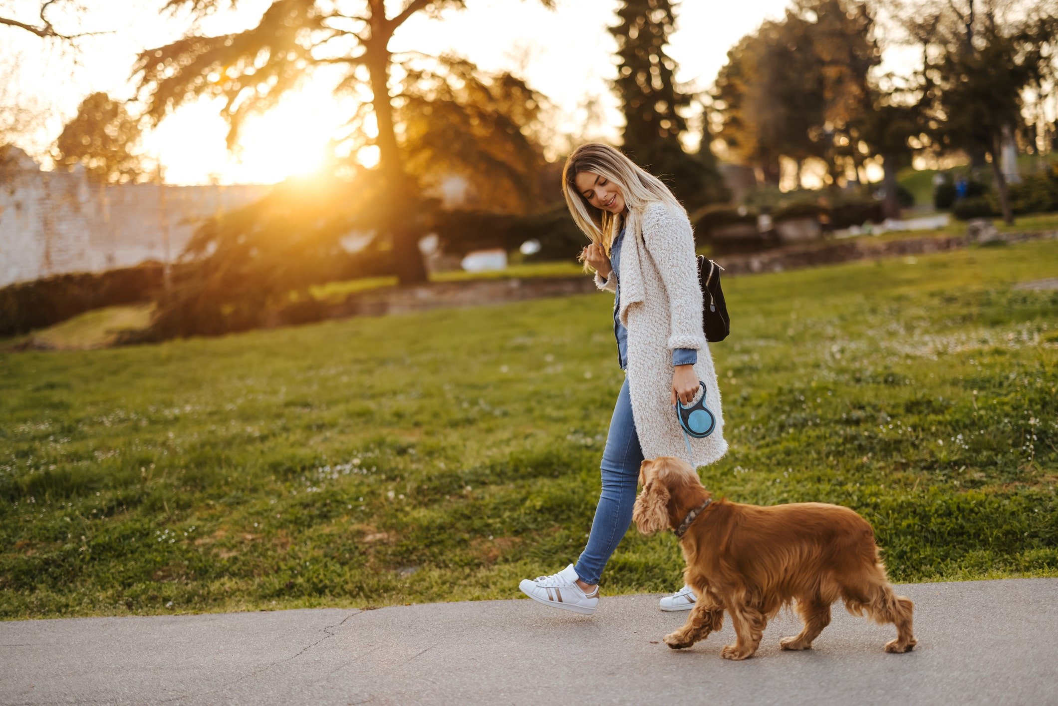 woman walking dog woman walking dog