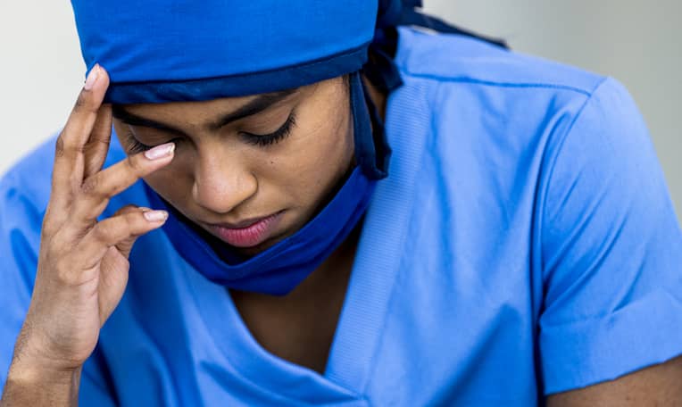 overworked female nurse overworked female nurse