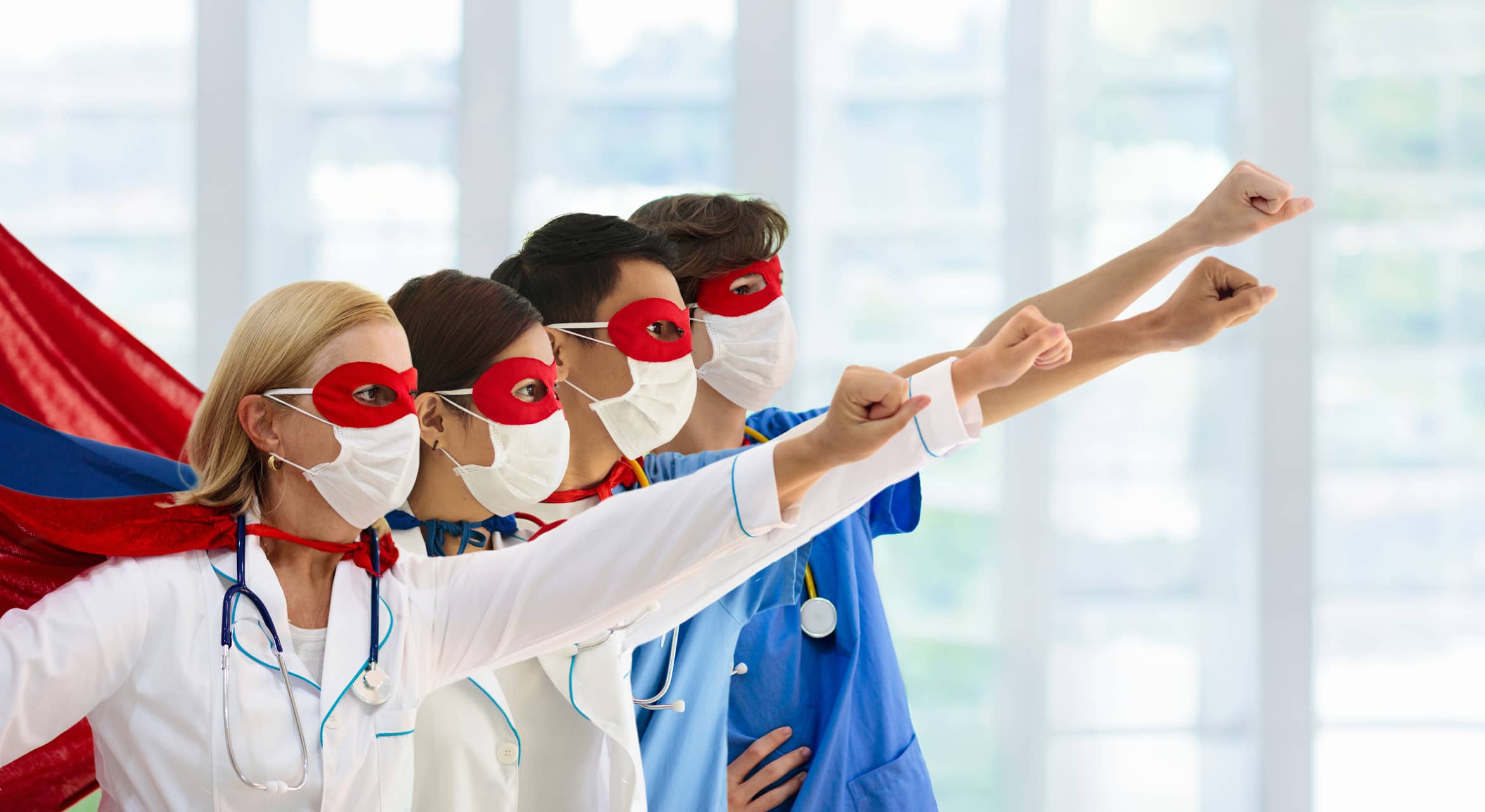 healthcare workers dressed as heroes