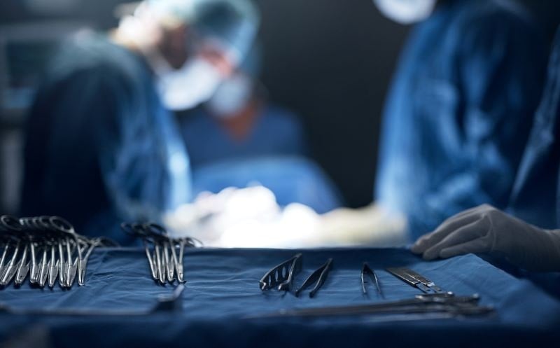 doctors performing surgery in operating room doctors performing surgery in operating room