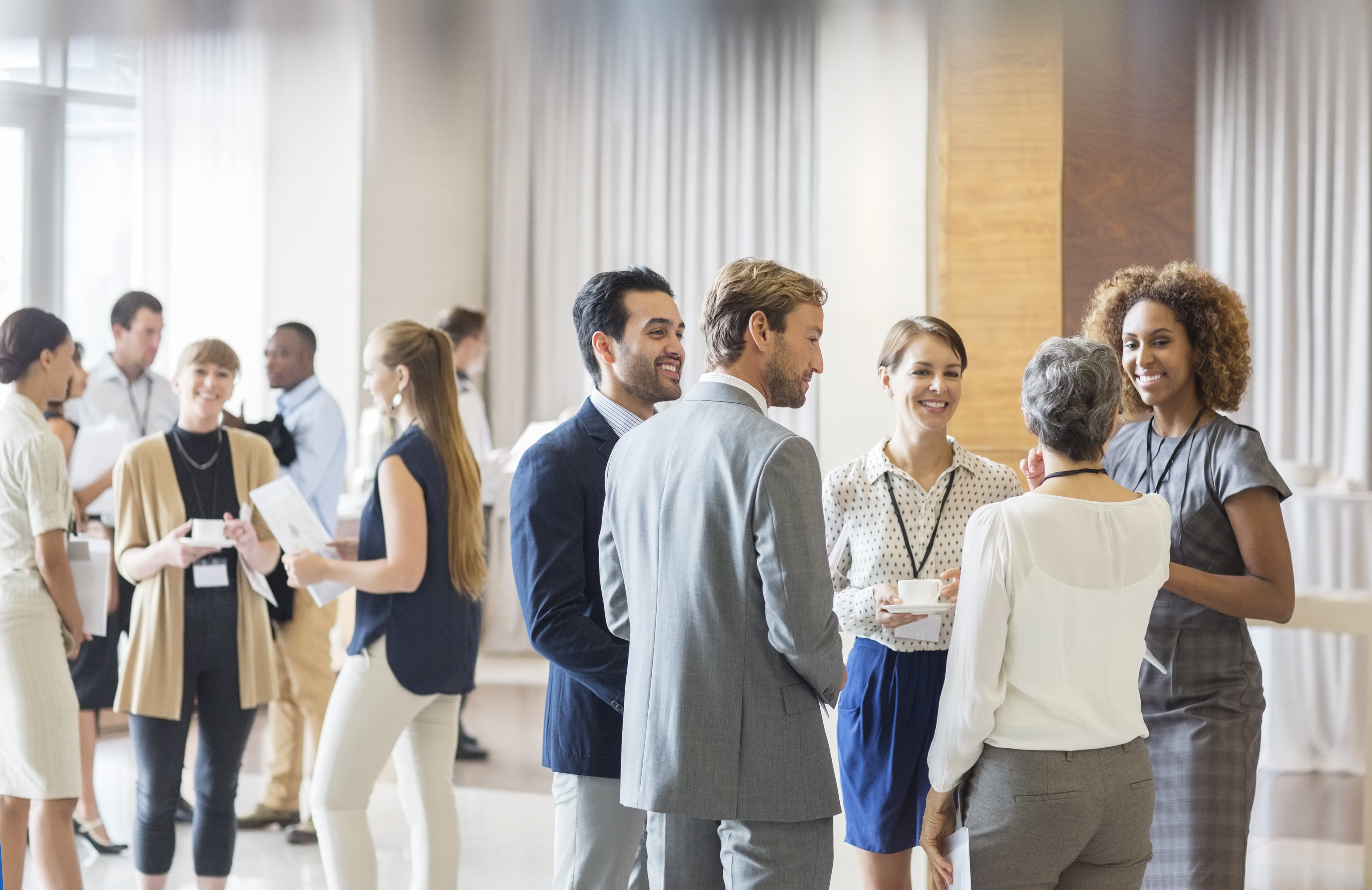 group of businesspeople at a conference group of businesspeople at a conference