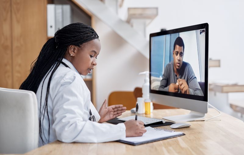 doctor conducting virtual visit with patient doctor conducting virtual visit with patient