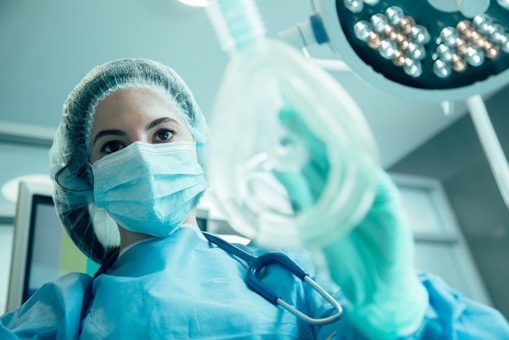 a CRNA working in an operating room environment