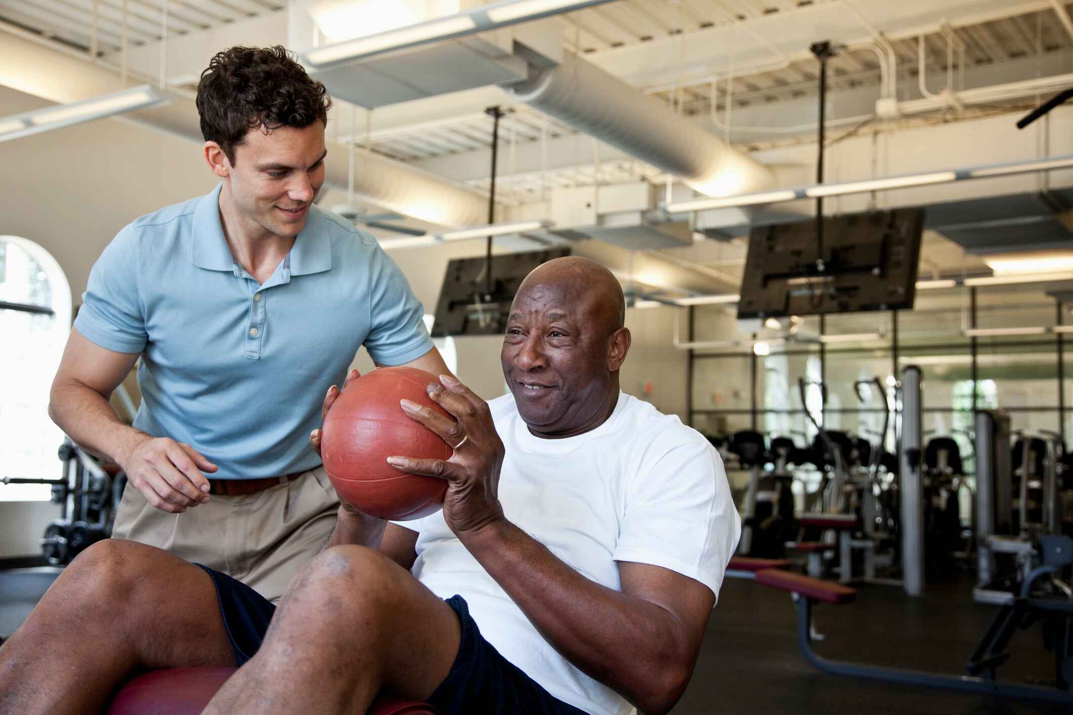 Specialized PT working with a client