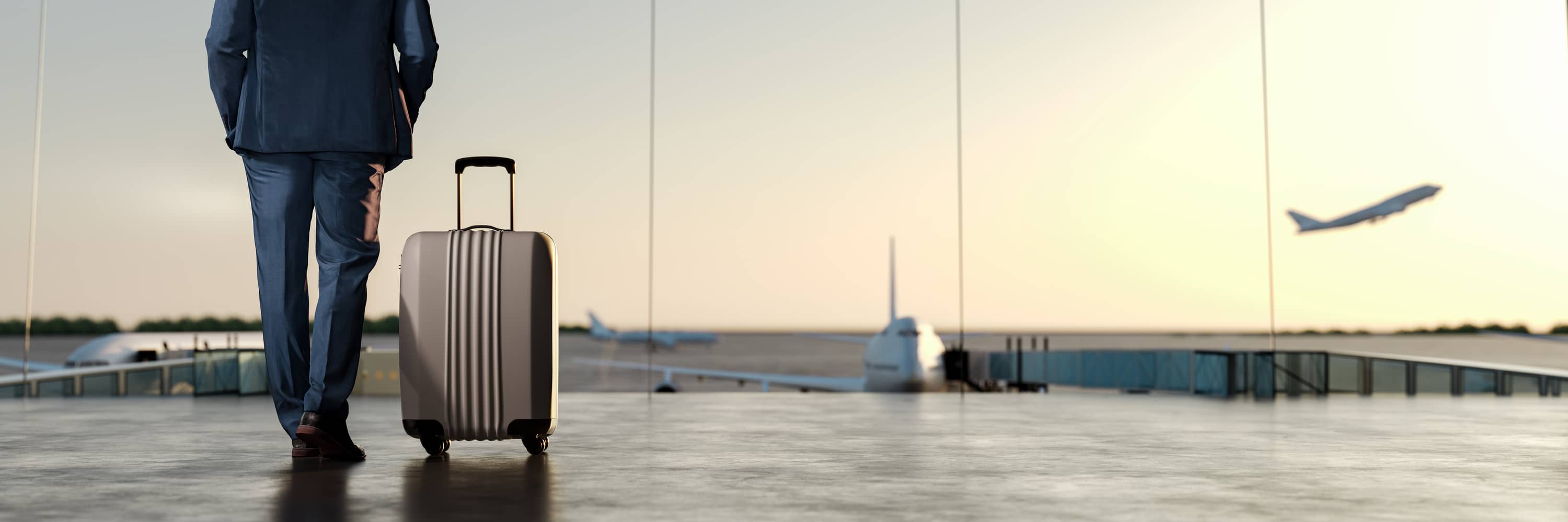 Traveler pulling a carry on suitcase at the airport