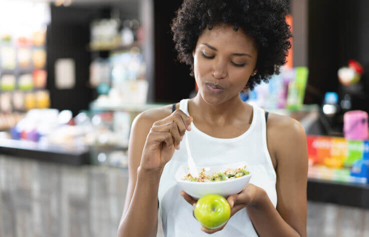 Travel nurse eating a salad