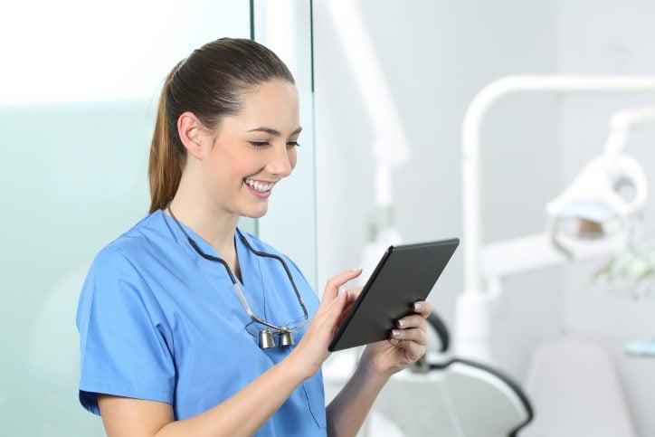 nurse using an ipad