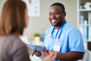 nurse smiling at patient