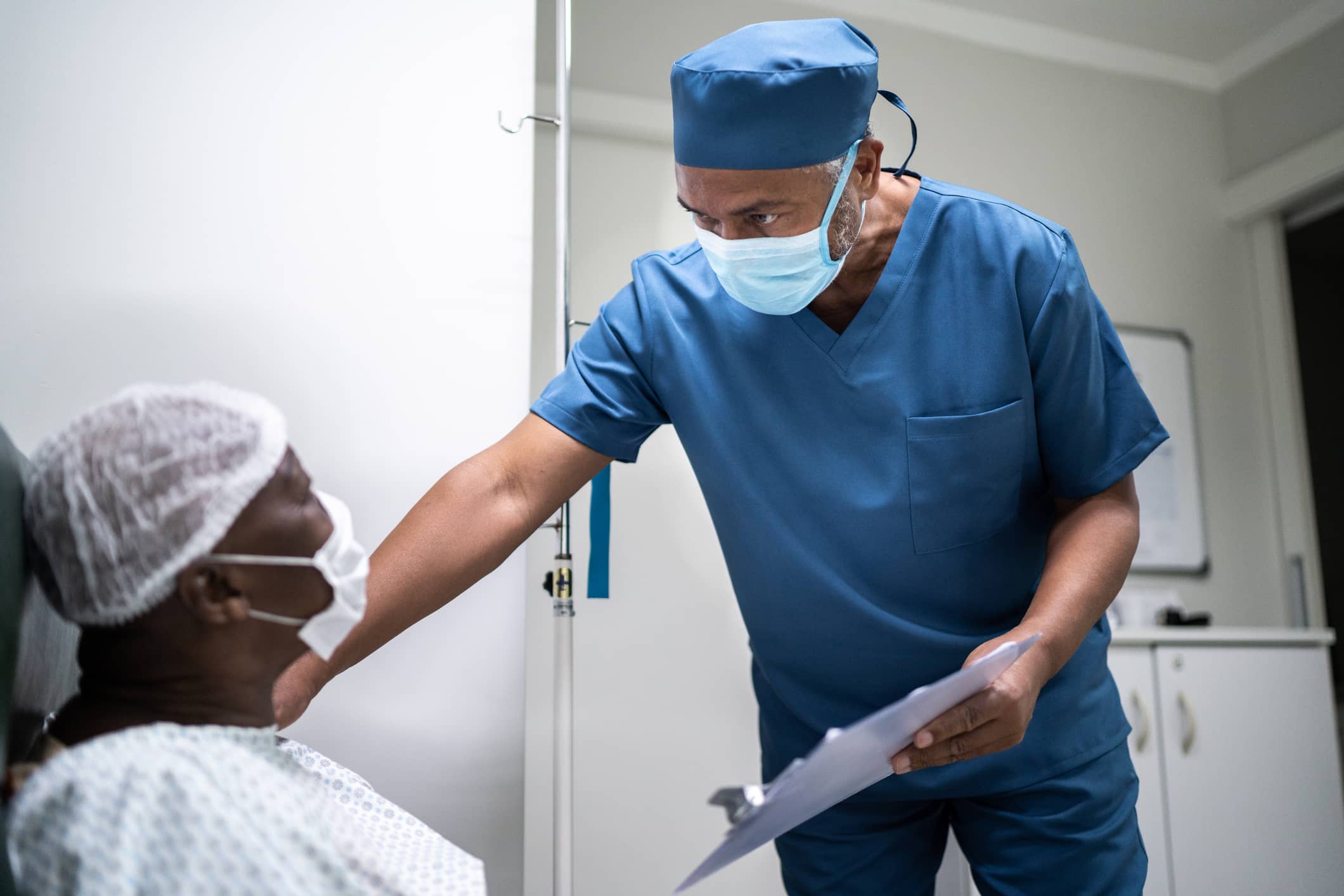 Male Nurse With Patient Male Nurse With Patient