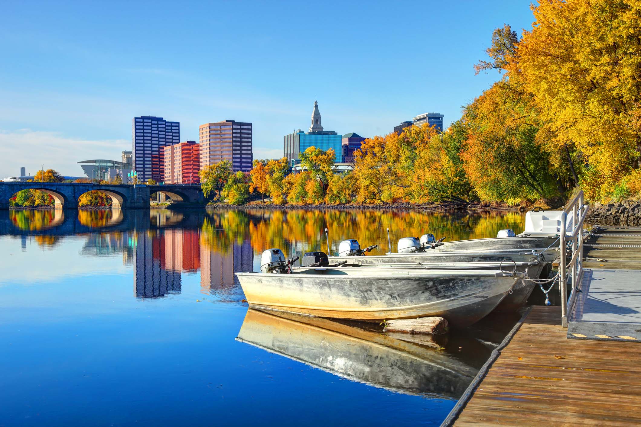 boats in water on a fall day