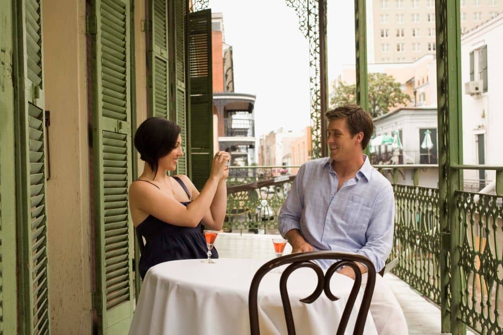 couple taking pictures in french quarter