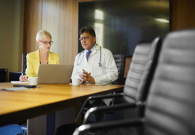 Chief Medical Officer speaking with leadership