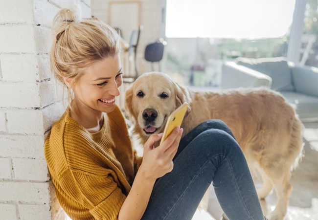 Woman sitting with dog