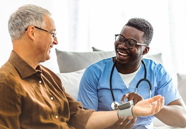 nurse and patient smiling