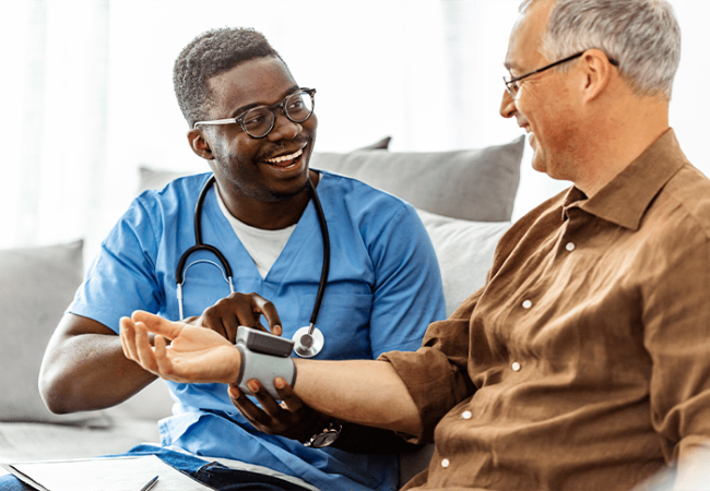 Nurse assisting patient