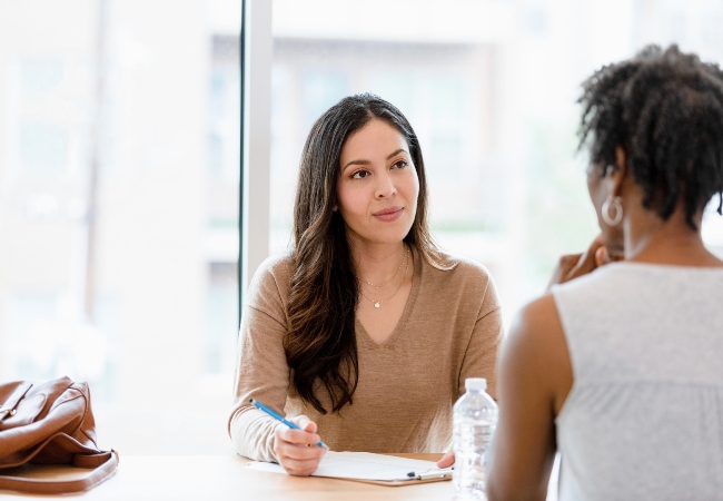 Psychologist listening to patient's concern.