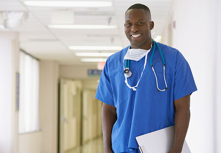 Male nurse with clipboard
