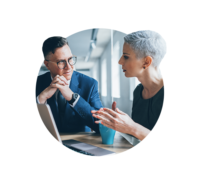 Business woman explaining information to business man